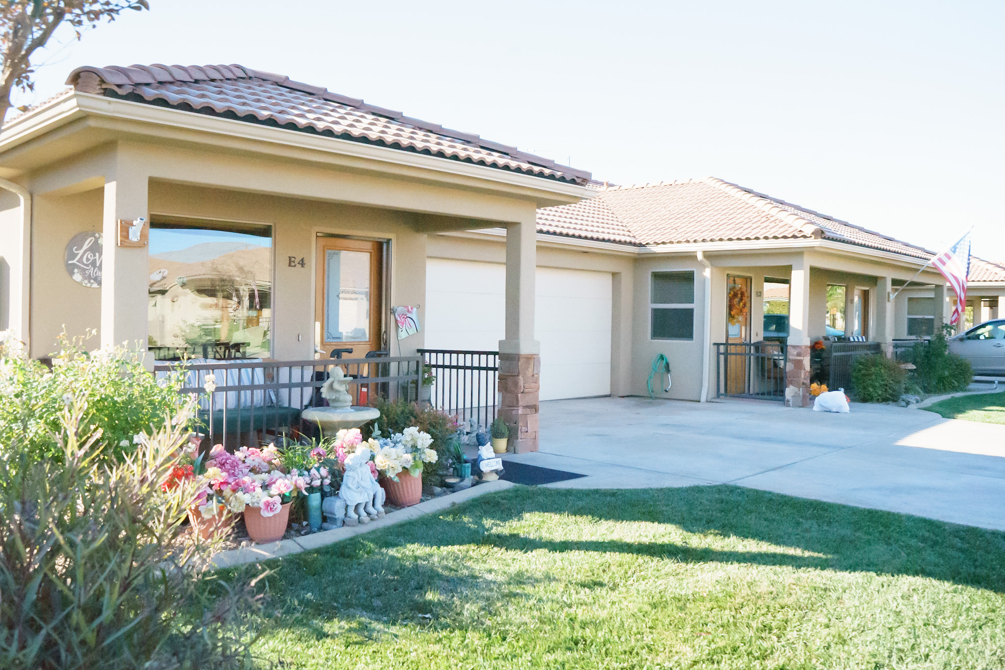 Suburban house with landscaped front yard.